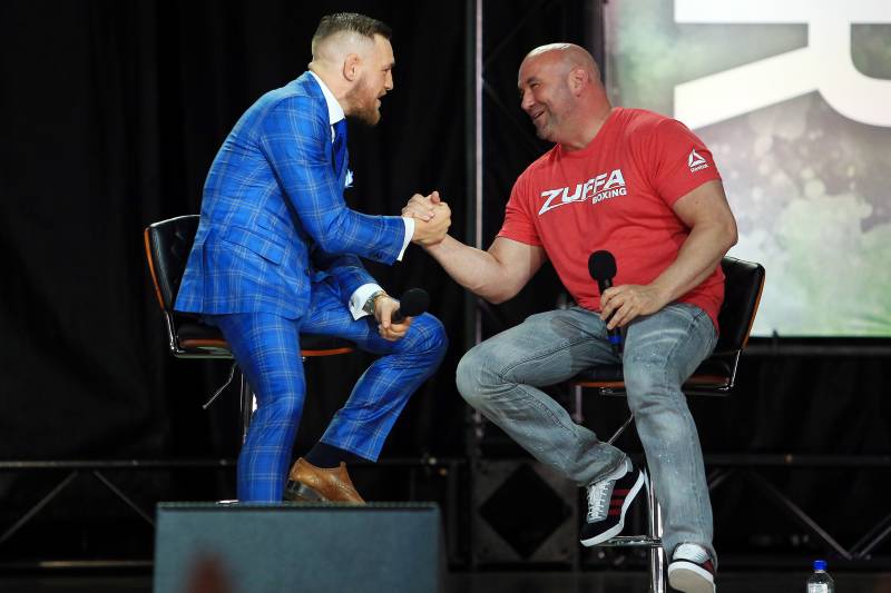 TORONTO, ON - JULY 12: Conor McGregor shakes hands with UFC President Dana White during the Floyd Mayweather Jr. v Conor McGregor World Press Tour at Budweiser Stage on July 12, 2017 in Toronto, Canada. (Photo by Vaughn Ridley/Getty Images)