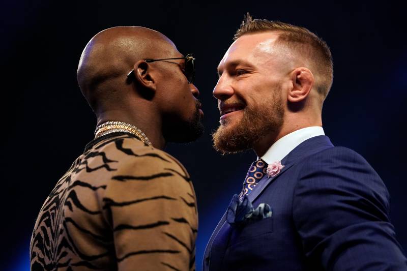 LONDON, ENGLAND - JULY 14: (R-L) Conor McGregor and Floyd Mayweather Jr. face off during the Floyd Mayweather Jr. v Conor McGregor World Press Tour event at SSE Arena on July 14, 2017 in London, England. (Photo by Jeff Bottari/Zuffa LLC/Zuffa LLC via Getty Images)