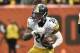 Pittsburgh Steelers running back Le'Veon Bell (26) runs with the ball during an NFL football game against the Cleveland Browns in Cleveland, Sunday, Nov. 20, 2016. The Steelers won 24-9. (AP Photo/David Richard)