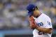 Los Angeles Dodgers starting pitcher Yu Darvish walks off the field after the first inning of a baseball game against the Chicago White Sox, Wednesday, Aug. 16, 2017, in Los Angeles. (AP Photo/Mark J. Terrill)