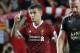 FILE - In this Saturday, July 22, 2017 file photo, Liverpool's Philippe Coutinho celebrates after scoring a goal during the final match against Leicester City FC at the Premier League Asia Trophy soccer tournament in Hong Kong. Liverpool’s American owners say Philippe Coutinho will not be sold in this transfer window, amid interest in the Brazil playmaker from Barcelona. In a short statement on Friday, Aug. 11, 2017, Fenway Sports Group say Liverpool’s “definitive stance is that no offers for Philippe will be considered.” (AP Photo/Kin Cheung, file)