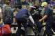 Seattle Seahawks offensive tackle George Fant is helped onto a cart after he went down on a play against the Minnesota Vikings during the first half of an NFL football preseason game, Friday, Aug. 18, 2017, in Seattle. (AP Photo/Stephen Brashear)