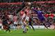STOKE ON TRENT, ENGLAND - AUGUST 19: Jack Butland of Stoke City punches the ball out during the Premier League match between Stoke City and Arsenal at Bet365 Stadium on August 19, 2017 in Stoke on Trent, England. (Photo by Alex Livesey/Getty Images)