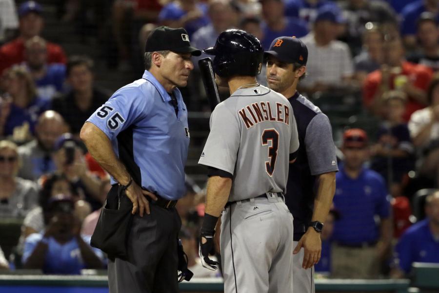 MLB umpires wearing white wristbands in protest of 'escalating