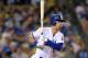 Los Angeles Dodgers' Cody Bellinger hits an RBI single during the third inning of a baseball game against the San Diego Padres, Friday, Aug. 11, 2017, in Los Angeles. (AP Photo/Mark J. Terrill)