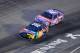 Aug 19, 2017; Bristol, TN, USA; Driver Kyle Larson (42) and Kyle Busch (18) during the Monster Energy NASCAR Cup Series Bass Pro Shops NRA Night Race at Bristol Motor Speedway. Mandatory Credit: Randy Sartin-USA TODAY Sports