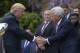 President Donald Trump shakes hands with New England Patriots owner Robert Kraft, accompanied by head coach Bill Belichick, center, during a ceremony on the South Lawn of the White House in Washington, Wednesday, April 19, 2017, where the president honored the Super Bowl Champion New England Patriots for their Super Bowl LI victory.. (AP Photo/Susan Walsh)