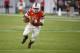 Miami quarterback Malik Rosier runs for a touchdown during the second half of an NCAA college football game against Florida A&M, Saturday, Sept. 3, 2016 in Miami Gardens, Fla. Miami defeated Florida A&M 70-3. (AP Photo/Wilfredo Lee)