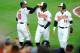 BALTIMORE, MD - AUGUST 21: Jonathan Schoop #6 of the Baltimore Orioles celebrates with Adam Jones #10 and Manny Machado #13 after hitting a three-run home run in the fifth inning against the Oakland Athletics at Oriole Park at Camden Yards on August 21, 2017 in Baltimore, Maryland. (Photo by Greg Fiume/Getty Images)