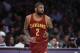 Cleveland Cavaliers' Kyrie Irving makes his way down the court during the first half of an NBA basketball game against the Los Angeles Lakers Sunday, March 19, 2017, in Los Angeles. (AP Photo/Jae C. Hong)