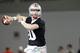 Ohio State quarterback Joe Burrow drops back to pass during spring NCAA college football practice Tuesday, March 7, 2017, in Columbus, Ohio. (AP Photo/Jay LaPrete)