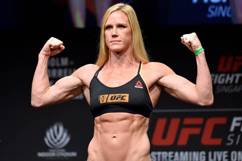 SINGAPORE - JUNE 16: Holly Holm of the United States poses on the scale during the UFC Fight Night weigh-in at the Marina Bay Sands on June 16, 2017 in Singapore. (Photo by Brandon Magnus/Zuffa LLC/Zuffa LLC via Getty Images)