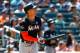 NEW YORK, NY - AUGUST 20: Giancarlo Stanton #27 of the Miami Marlins watches the flight of his seventh inning three run home run against the New York Mets at Citi Field on August 20, 2017 in the Flushing neighborhood of the Queens borough of New York City. (Photo by Jim McIsaac/Getty Images)
