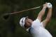 Hideki Matsuyama of Japan, watches his tee shot on the third hole during the final round of the PGA Championship golf tournament at the Quail Hollow Club Sunday, Aug. 13, 2017, in Charlotte, N.C. (AP Photo/Chuck Burton)