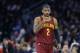 Cleveland Cavaliers guard Kyrie Irving walks up court during the first half of an NBA basketball game against the Detroit Pistons, Friday, Jan. 29, 2016 in Auburn Hills, Mich. (AP Photo/Carlos Osorio)