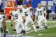 New York Jets quarterbacks Bryce Petty (9) Christian Hackenberg (5) and Josh McCown (15) stretch before an NFL pre-season football game against the Detroit Lions, Saturday, Aug. 19, 2017, in Detroit. (AP Photo/Paul Sancya)