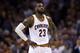 CLEVELAND, OH - JUNE 16: LeBron James #23 of the Cleveland Cavaliers reacts against the Golden State Warriors during Game Six of the 2015 NBA Finals at Quicken Loans Arena on June 16, 2015 in Cleveland, Ohio. NOTE TO USER: User expressly acknowledges and agrees that, by downloading and or using this photograph, user is consenting to the terms and conditions of Getty Images License Agreement. (Photo by Ezra Shaw/Getty Images)