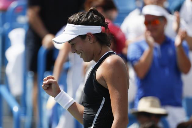 Garbine Muguruza, of Spain, reacts after defeating Simona Halep, of Romania, in the women's singles final at the Western & Southern Open, Sunday, Aug. 20, 2017, in Mason, Ohio. Muguruza won 6-1, 6-0. (AP Photo/John Minchillo)