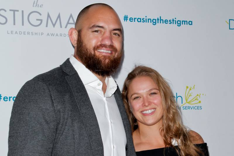 BEVERLY HILLS, CA - APRIL 28: (L-R) Travis Browne and Ronda Rousey attend the 20th anniversary of 'Erasing The Stigma Leadership Awards' at The Beverly Hilton Hotel on April 28, 2016 in Beverly Hills, California. (Photo by Tibrina Hobson/Getty Images)