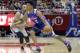 Philadelphia 76ers guard Markelle Fultz (7) drives around Utah Jazz guard Dante Exum during the first half of an NBA summer league basketball game Wednesday, July 5, 2017, in Salt Lake City. (AP Photo/Rick Bowmer)