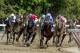 SARATOGA SPRINGS, NY - AUGUST 26: Practical Joke (red cap, inside) #1, with Joel Rosario comes up the rail on the turn for home en route to winning the H. Allen Jerkens Stakes on Travers Stakes Day at Saratoga Race Course on August 26, 2017 in Saratoga Springs, New York. (Photo by Bob Mayberger/Eclipse Sportswire/Getty Images)
