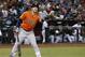 Houston Astros' Alex Bregman flips a baseball out of play during the eighth inning of a baseball game against the Arizona Diamondbacks Tuesday, Aug. 15, 2017, in Phoenix. The Astros defeated the Diamondbacks 9-4. (AP Photo/Ross D. Franklin)
