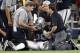 Oakland Raiders cornerback David Amerson (29) is checked on by team medical staff after suffering an unknown injury in the first half of a preseason NFL football game against the Dallas Cowboys on Saturday, Aug. 26, 2017, in Arlington, Texas. (AP Photo/Ron Jenkins)