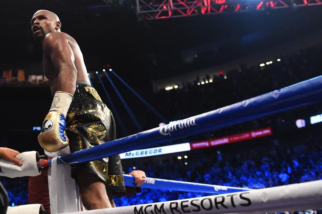 LAS VEGAS, NV - AUGUST 26:  Floyd Mayweather Jr. celebrates his TKO of Conor McGregor in their super welterweight boxing match on August 26, 2017 at T-Mobile Arena in Las Vegas, Nevada.  (Photo by Josh Hedges/Zuffa LLC/Zuffa LLC via Getty Images )