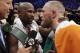 Floyd Mayweather Jr., left, embraces Conor McGregor after a super welterweight boxing match Saturday, Aug. 26, 2017, in Las Vegas. (AP Photo/Isaac Brekken)