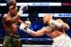 Aug 26, 2017; Las Vegas, NV, USA; Conor McGregor moves in with a hit against Floyd Mayweather Jr. during the sixth round at T-Mobile Arena. Mandatory Credit: Mark J. Rebilas-USA TODAY Sports
