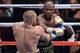 Aug 26, 2017; Las Vegas, NV, USA; Floyd Mayweather Jr. (black trunks) and Conor McGregor (white trunks) box during the eighth round of their boxing match at T-Mobile Arena. Mandatory Credit: Joe Camporeale-USA TODAY Sports