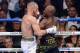 Aug 26, 2017; Las Vegas, NV, USA; Floyd Mayweather Jr. (black trunks) taunts Conor McGregor (white trunks) during their boxing match at T-Mobile Arena. Mayweather won via tenth round TKO. Mandatory Credit: Joe Camporeale-USA TODAY Sports