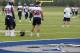 Houston Texans' Whitney Mercilus (59) and Brian Cushing (56) stand on the field as they wait to participate in drills during a morning practice at the Dallas Cowboys training facility, Monday, Aug. 28, 2017, in Frisco, Texas. The Texans are working out in the practice facility of the Cowboys because of floods pounding Houston. An exhibition game in the Texans' stadium Thursday might be moved to the home of the Cowboys. (AP Photo/Tony Gutierrez)