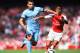 LONDON, ENGLAND - SEPTEMBER 13: Sergio Aguero of Manchester City and Alexis Sanchez of Arsenal battle for the ball during the Barclays Premier League match between Arsenal and Manchester City at Emirates Stadium on September 13, 2014 in London, England. (Photo by Shaun Botterill/Getty Images)