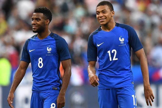 France's forward Thomas Lemar (L) and midfielder Kylian Mbappe react following their 3-2 win over England in their international friendly football match between France and England at The Stade de France Stadium in Saint-Denis near Paris on June 13, 2017.                 / AFP PHOTO / FRANCK FIFE        (Photo credit should read FRANCK FIFE/AFP/Getty Images)