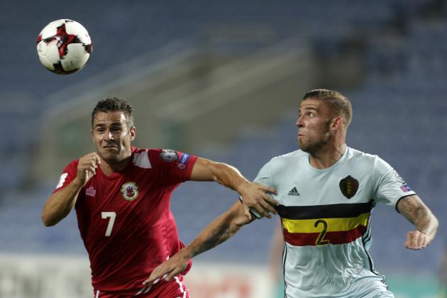 Gibraltar's forward Lee Casciaro (L) vies with Belgium's defender Toby Alderweireld during the WC 2018 football qualification match Gibraltar vs Belgium at the Faro Municipal Stadium in Faro on October 10, 2016. / AFP / JOSE MANUEL RIBEIRO        (Photo credit should read JOSE MANUEL RIBEIRO/AFP/Getty Images)