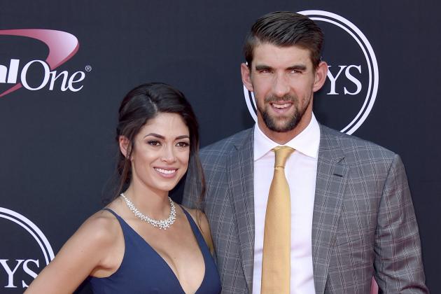 Nicole Johnson, left, and Michael Phelps arrive at the ESPYS at the Microsoft Theater on Wednesday, July 12, 2017, in Los Angeles. (Photo by Jordan Strauss/Invision/AP)
