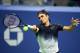 Switzerland's Roger Federer returns the ball to Frances Tiafoe of the US during their 2017 US Open Men's Singles match at the USTA Billie Jean King National Tennis Center in New York on August 29, 2017. / AFP PHOTO / Jewel SAMAD (Photo credit should read JEWEL SAMAD/AFP/Getty Images)