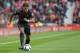 Arsenal's English midfielder Alex Oxlade-Chamberlain runs with the ball during the English Premier League football match between Stoke City and Arsenal at the Bet365 Stadium in Stoke-on-Trent, central England on August 19, 2017. / AFP PHOTO / Roland Harrison / RESTRICTED TO EDITORIAL USE. No use with unauthorized audio, video, data, fixture lists, club/league logos or 'live' services. Online in-match use limited to 75 images, no video emulation. No use in betting, games or single club/league/player publications. / (Photo credit should read ROLAND HARRISON/AFP/Getty Images)