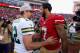 SANTA CLARA, CA - OCTOBER 04: Colin Kaepernick #7 of the San Francisco 49ers talks with Aaron Rodgers #12 of the Green Bay Packers after their game at Levi's Stadium on October 4, 2015 in Santa Clara, California. (Photo by Ezra Shaw/Getty Images)