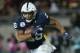 PASADENA, CA - JANUARY 02: Running back Saquon Barkley #26 of the Penn State Nittany Lions runs with the ball against the USC Trojans during the 2017 Rose Bowl Game presented by Northwestern Mutual at the Rose Bowl on January 2, 2017 in Pasadena, California. (Photo by Stephen Dunn/Getty Images)