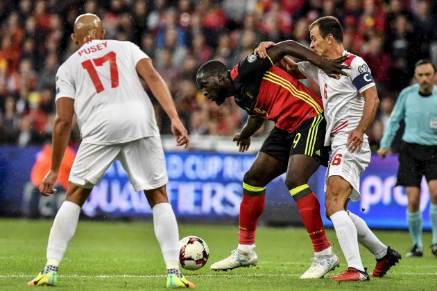 (From L) Gibraltar's Jason Pusey, Belgium's Romelu Lukaku and Gibraltar's Roy Chipolina vie for the ball during the WC 2018 football qualification football match between Belgium and Gilbratlar, at the Dufrasne Stadium, on August 31, 2017 in Sclessin.  / AFP PHOTO / Belga / DIRK WAEM / Belgium OUT        (Photo credit should read DIRK WAEM/AFP/Getty Images)