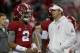 ATLANTA, GA - DECEMBER 31:  Jalen Hurts #2 of the Alabama Crimson Tide and Offensive Coordinator Lane Kiffin of the Alabama Crimson Tide talk during pre gamethe 2016 Chick-fil-A Peach Bowl at the Georgia Dome on December 31, 2016 in Atlanta, Georgia.  (Photo by Streeter Lecka/Getty Images)