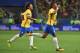 Brazil's Paulinho (R) celebrates with teammate Marcelo after scoring against Ecuador during their 2018 World Cup football qualifier match in Porto Alegre, Brazil, on August 31, 2017. / AFP PHOTO / Nelson ALMEIDA (Photo credit should read NELSON ALMEIDA/AFP/Getty Images)