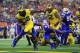 ARLINGTON, TX - SEPTEMBER 02: Karan Higdon #22 of the Michigan Wolverines scores a third quarter touchdown against the Florida Gators at AT&T Stadium on September 2, 2017 in Arlington, Texas. (Photo by Ronald Martinez/Getty Images)
