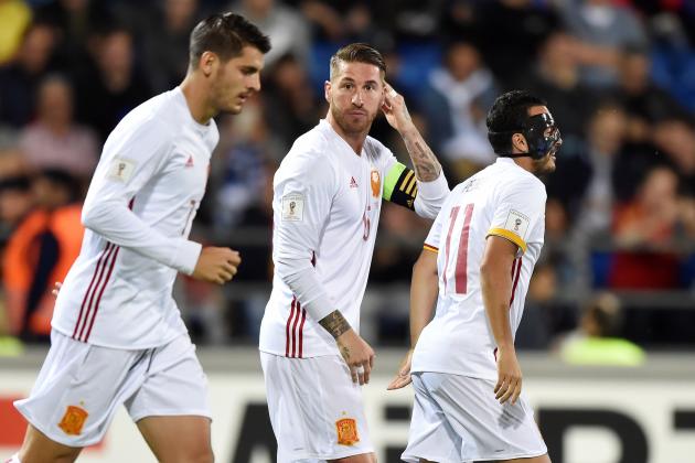 Spain's Sergio Ramos (C) reacts next to his teammates Alvaro Morata (L) and Pedro Rodriguez after scoring a  goal  during the FIFA World Cup 2018 qualification football match between Liechtenstein and Spain on September 5, 2017 in Vaduz. / AFP PHOTO / Michael Buholzer        (Photo credit should read MICHAEL BUHOLZER/AFP/Getty Images)