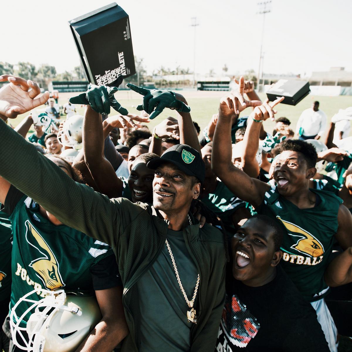 Snoop Dogg Surprises His Old High School Football Team with New Kicks