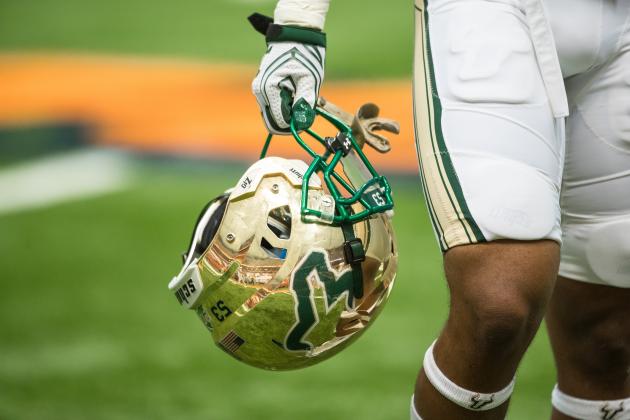 SYRACUSE, NY - SEPTEMBER 17:  A player carries his South Florida Bulls helmet before the game against the Syracuse Orange on September 17, 2016 at The Carrier Dome in Syracuse, New York. South Florida defeats Syracuse 45-20.  (Photo by Brett Carlsen/Getty Images)