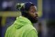 Seattle Seahawks' Michael Bennett warms-up before an NFL football game against the Carolina Panthers, Sunday, Dec. 4, 2016, in Seattle. (AP Photo/Ted S. Warren)