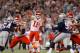 Alex Smith threw for 368 yards and four touchdowns Thursday night. Tom Brady had no touchdowns on 267 yards passing.